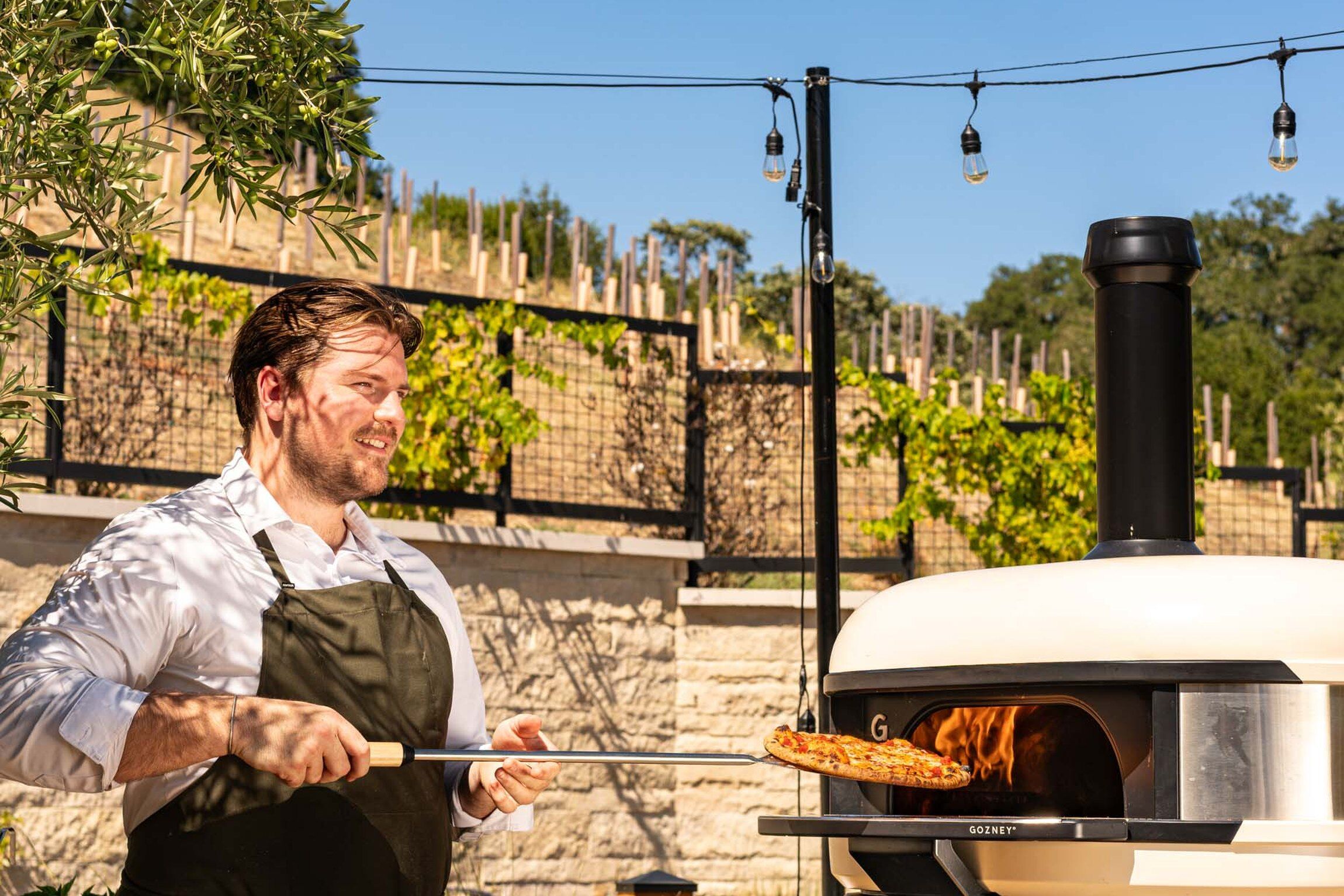 Firing pizza in a Gozney oven on the Grange Patio at Appellation Healdsburg