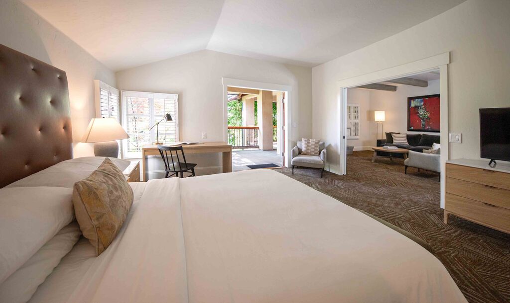 Two-bedroom suite living and kitchen area at Appellation Lodi - Wine & Roses Resort and Spa