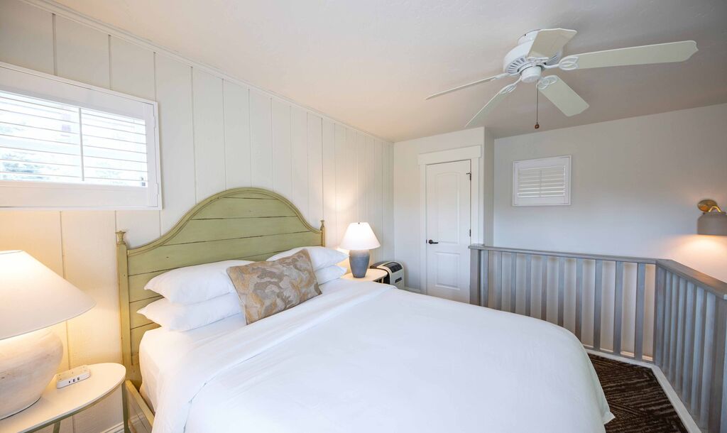One-bedroom loft suite bedroom at Appellation Lodi - Wine & Roses Resort and Spa